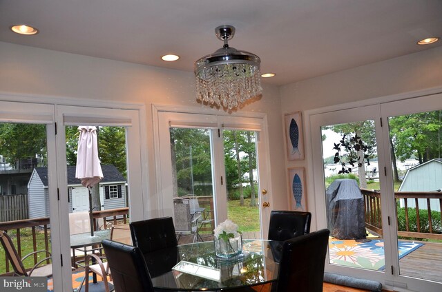 dining room featuring a notable chandelier and plenty of natural light