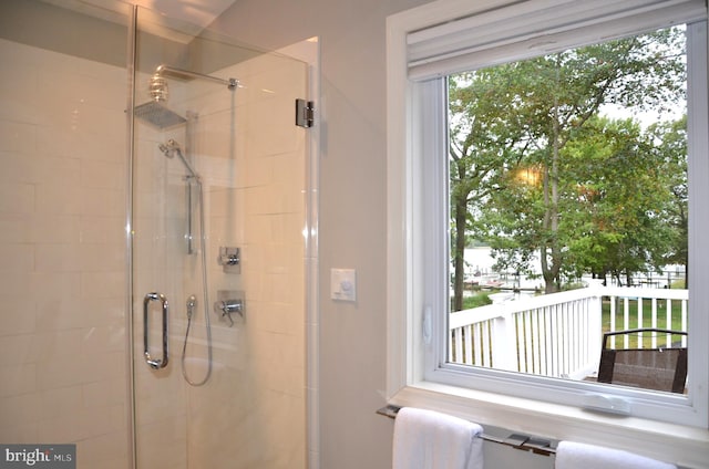 bathroom featuring walk in shower