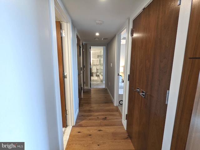 hall featuring light hardwood / wood-style flooring