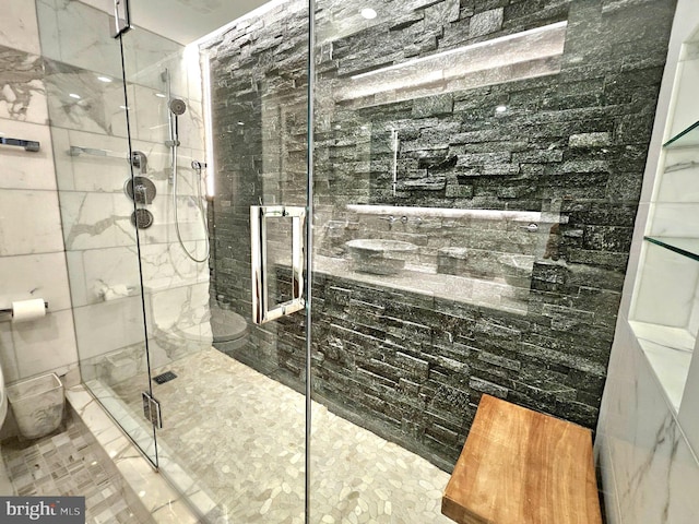 bathroom featuring tile walls, heating unit, and a stall shower