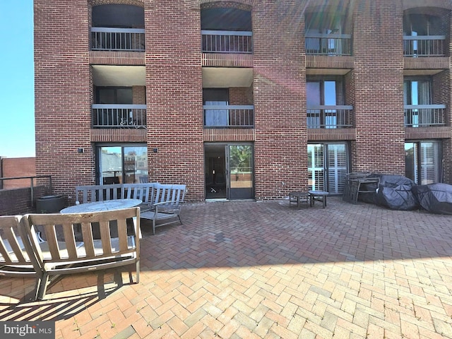 view of patio with outdoor dining area