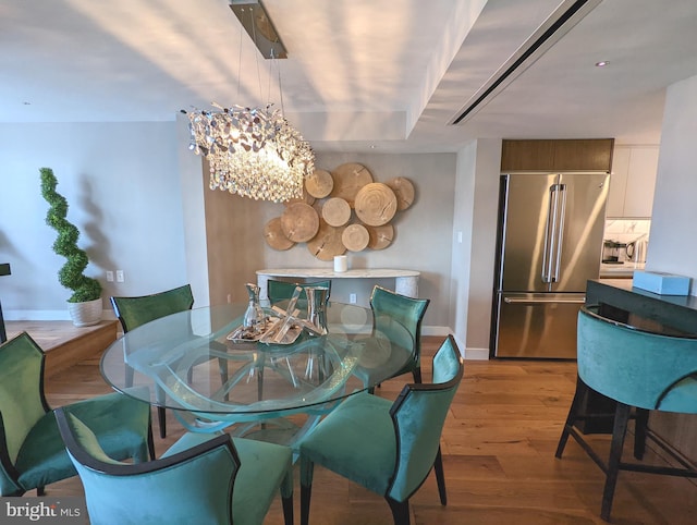 dining space featuring light hardwood / wood-style flooring