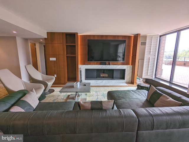 living room featuring a fireplace