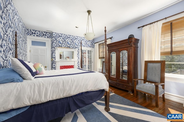 bedroom featuring dark hardwood / wood-style floors