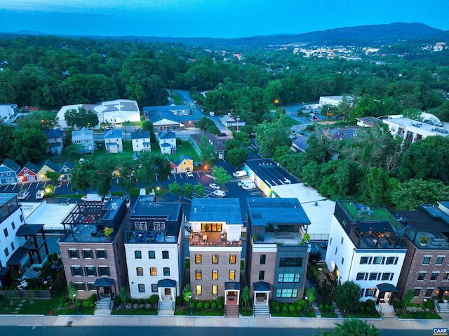 birds eye view of property featuring a mountain view