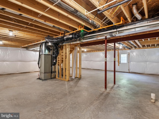 basement featuring heating unit