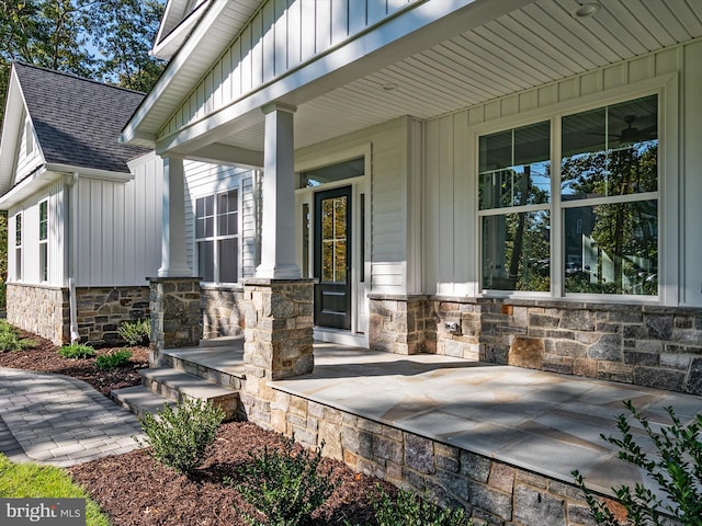 entrance to property featuring a porch