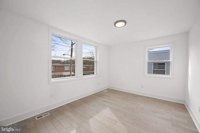 empty room featuring light hardwood / wood-style floors