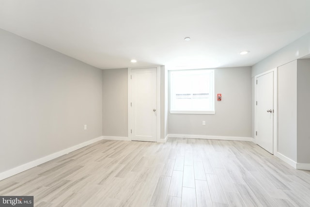 unfurnished bedroom with light wood-type flooring