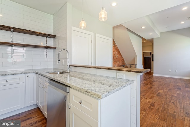 kitchen with dark wood-type flooring, white cabinetry, kitchen peninsula, and stainless steel dishwasher