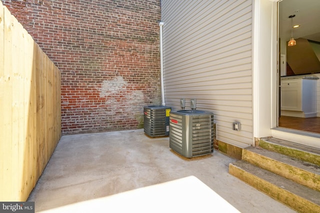 view of patio with central AC unit