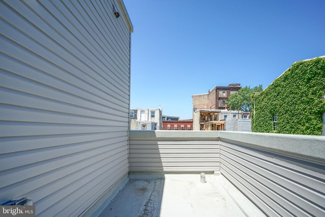 view of patio with a balcony