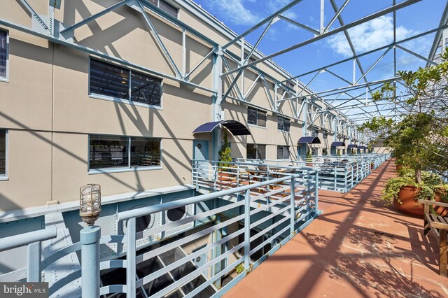 view of patio with a water view