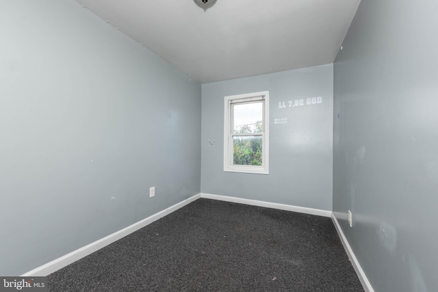 spare room featuring carpet floors