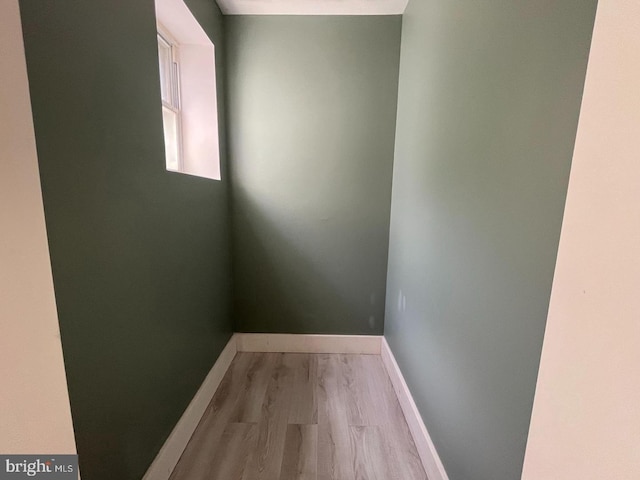 unfurnished room featuring light wood-type flooring