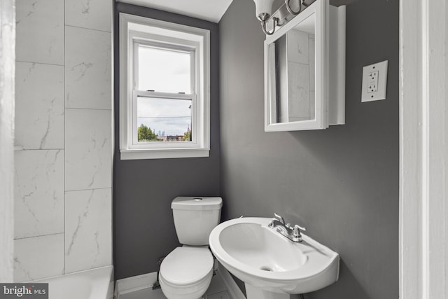 bathroom with sink and toilet