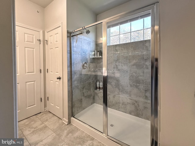 bathroom featuring an enclosed shower