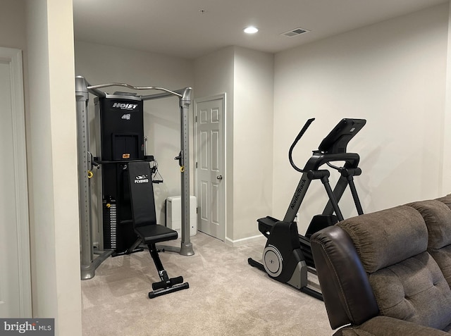 workout area with light colored carpet