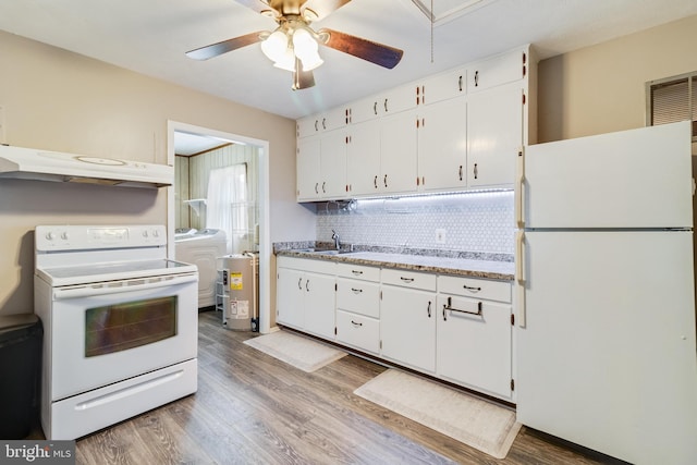 kitchen featuring light wood-type flooring, white cabinetry, white appliances, and range hood