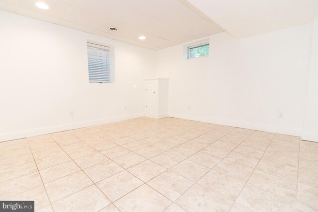 spare room featuring wooden walls and wooden ceiling