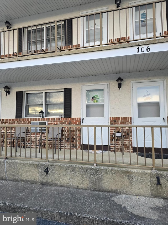 entrance to property with covered porch