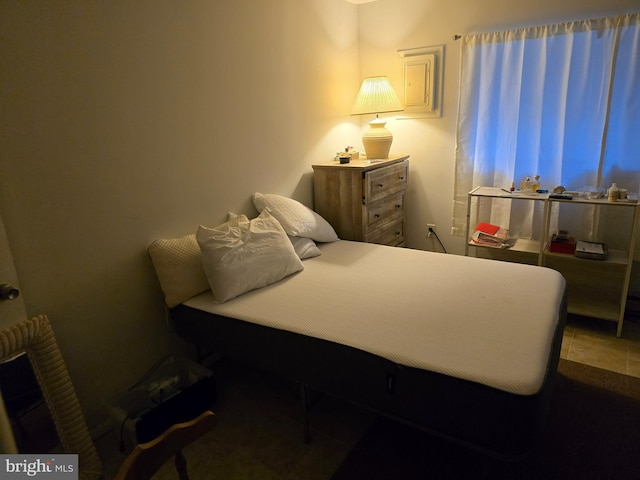 bedroom featuring tile patterned flooring