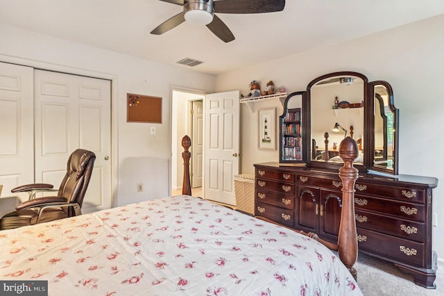 bedroom with a closet, carpet, and ceiling fan