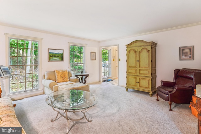 living room with light colored carpet and ornamental molding