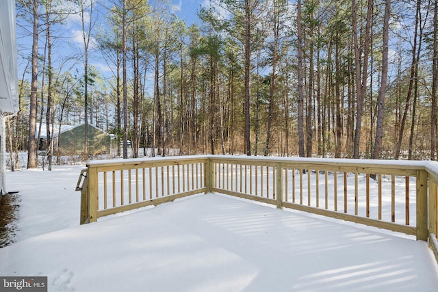 view of snow covered deck