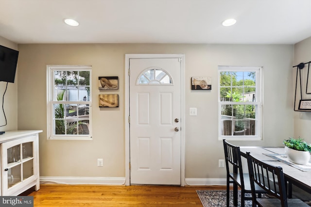 entrance foyer featuring hardwood / wood-style floors