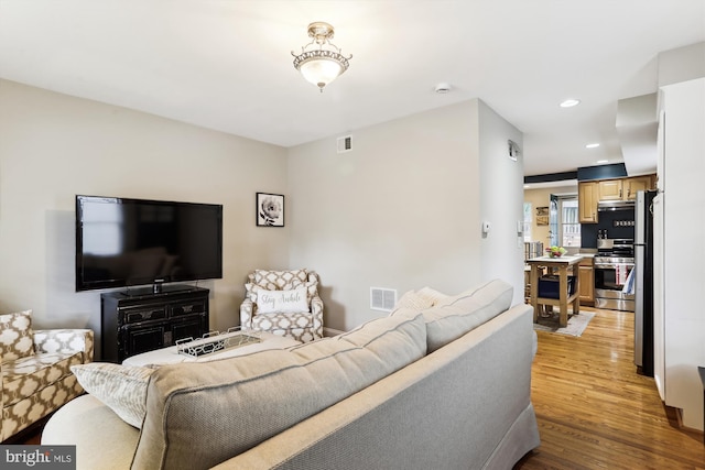 living room featuring light hardwood / wood-style flooring