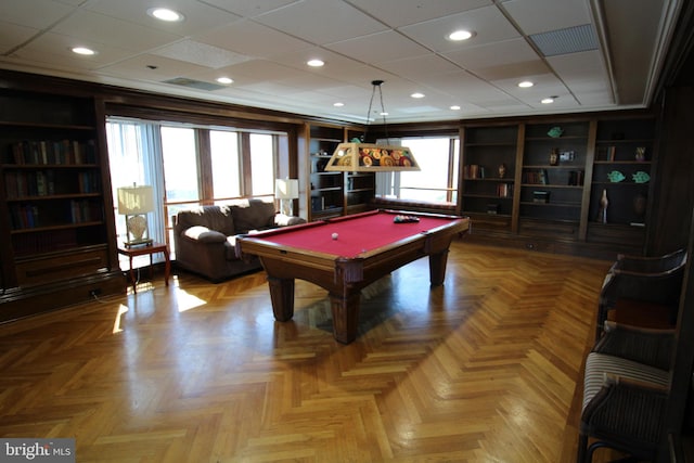 rec room featuring pool table, light parquet flooring, and a healthy amount of sunlight