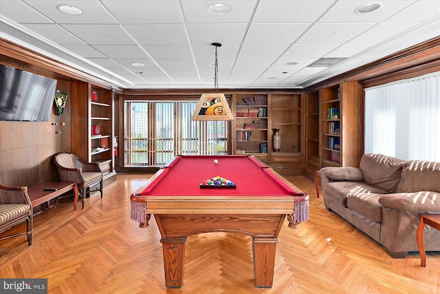 playroom featuring built in shelves, billiards, and parquet floors