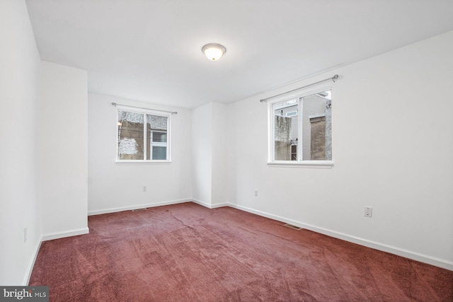 view of carpeted spare room