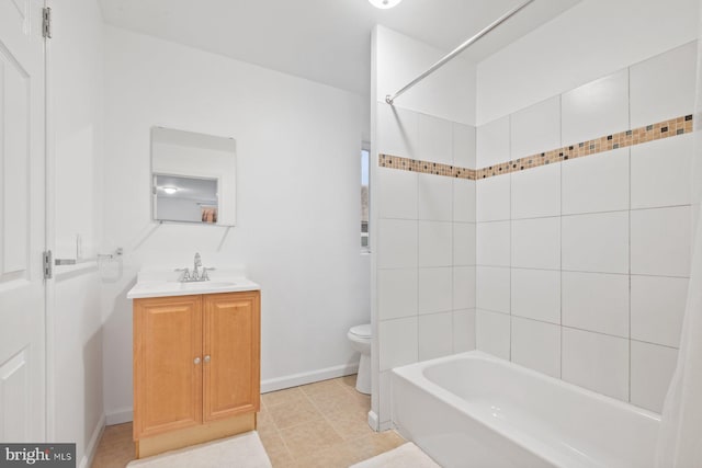 full bathroom featuring vanity, toilet, shower / bath combo with shower curtain, and tile patterned floors