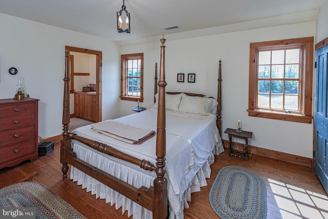 bedroom with wood-type flooring