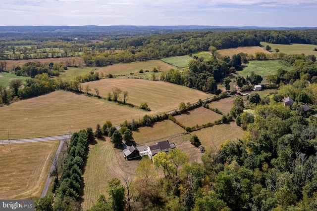 birds eye view of property featuring a rural view