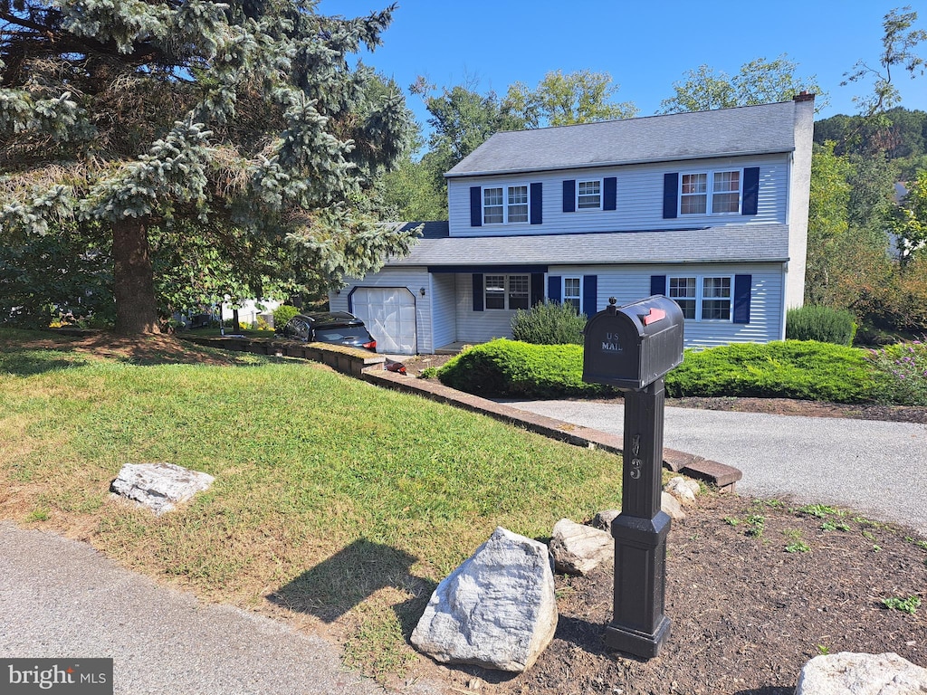 view of front of home with a front yard