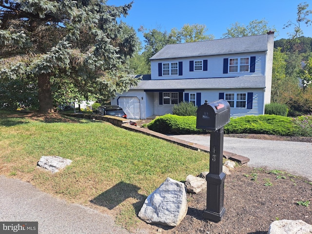 view of front of home with a front yard