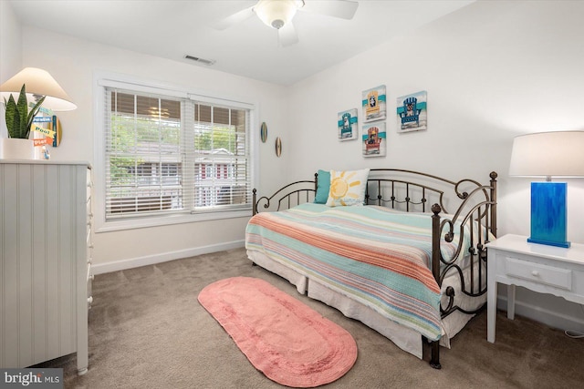 bedroom featuring light colored carpet and ceiling fan