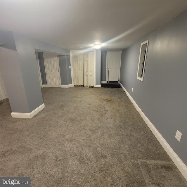 basement featuring carpet floors