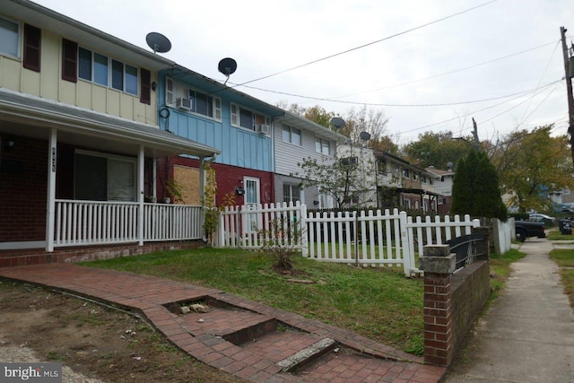 view of property exterior with covered porch