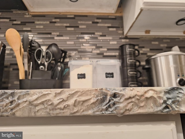 interior details featuring tasteful backsplash