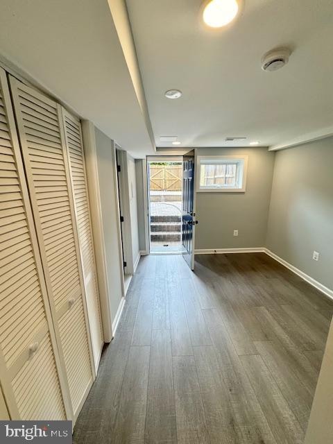 hall featuring dark hardwood / wood-style flooring