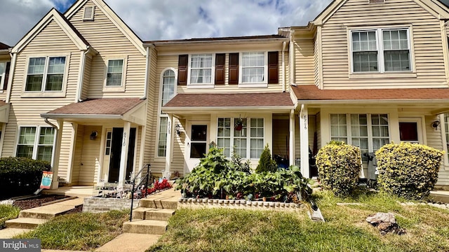 view of property with a porch