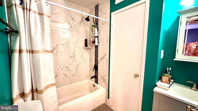 bathroom with vanity and shower / tub combo