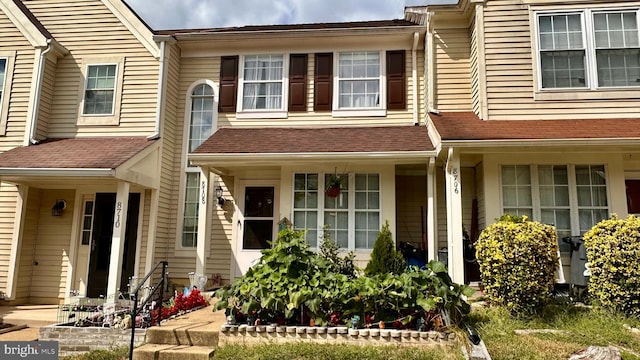 view of property with covered porch