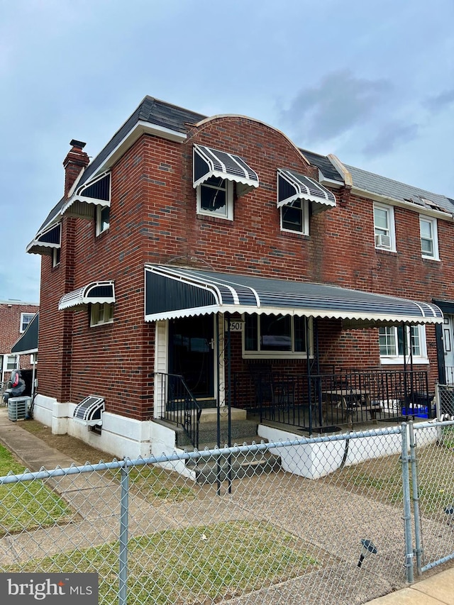 view of front facade featuring cooling unit