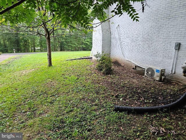 view of yard with ac unit