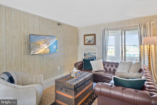 living room with wooden walls